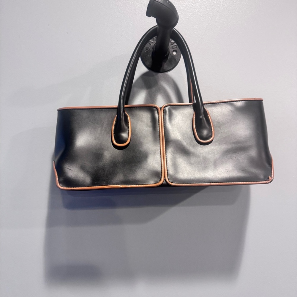 Tod's Elegant Black and Tan Shoulder Bag